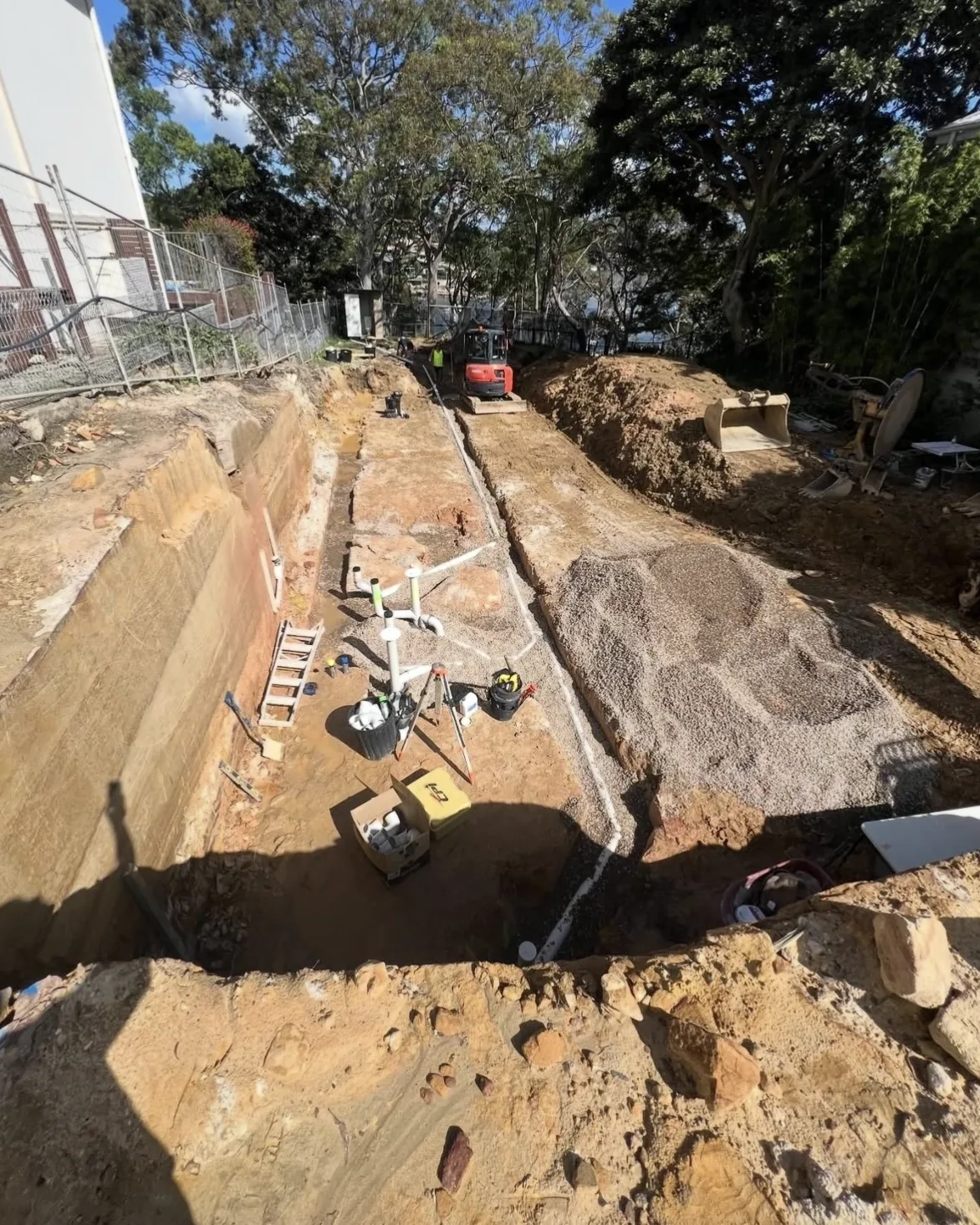Stormwater drainage trench and pipework on a plumbing project
